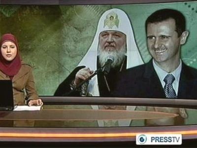 Асад и патриарх в эфире сирийских СМИ. Фото: inotv.rt.com